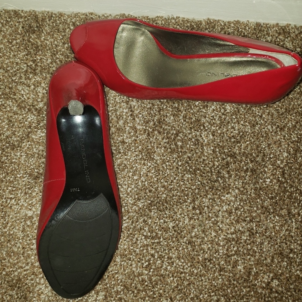 Red peep toe pumps